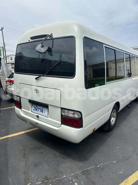 Big with watermark toyota coaster barbados greenland 5054