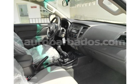 Buy Import Mitsubishi L200 White Car in Import - Dubai in Barbados Buy Import Mitsubishi L200 White Car in Import - Dubai in Barbados