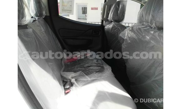 Buy Import Mitsubishi L200 White Car in Import - Dubai in Barbados Buy Import Mitsubishi L200 White Car in Import - Dubai in Barbados