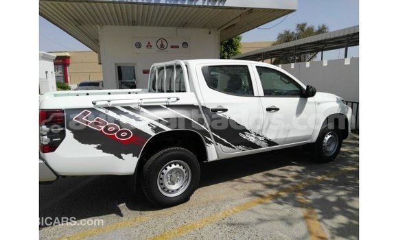 Buy Import Mitsubishi L200 White Car in Import - Dubai in Barbados Buy Import Mitsubishi L200 White Car in Import - Dubai in Barbados