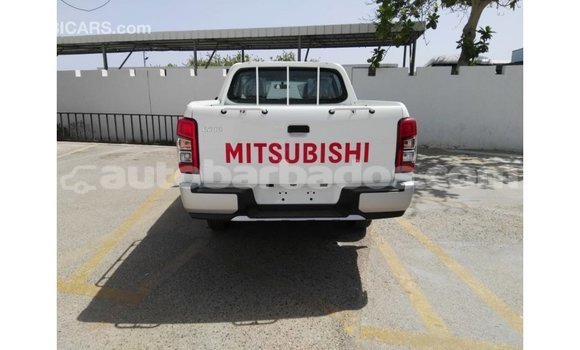 Buy Import Mitsubishi L200 White Car in Import - Dubai in Barbados Buy Import Mitsubishi L200 White Car in Import - Dubai in Barbados