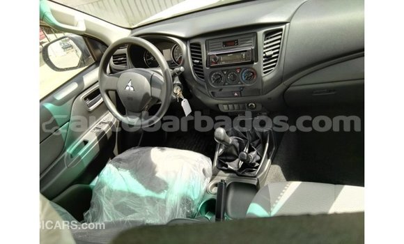 Buy Import Mitsubishi L200 White Car in Import - Dubai in Barbados Buy Import Mitsubishi L200 White Car in Import - Dubai in Barbados