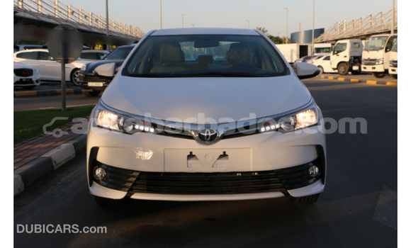 Buy Import Toyota Corolla White Car in Import - Dubai in Barbados Buy Import Toyota Corolla White Car in Import - Dubai in Barbados