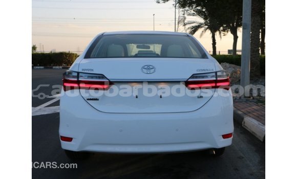 Buy Import Toyota Corolla White Car in Import - Dubai in Barbados Buy Import Toyota Corolla White Car in Import - Dubai in Barbados