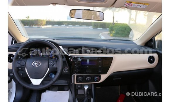 Buy Import Toyota Corolla White Car in Import - Dubai in Barbados Buy Import Toyota Corolla White Car in Import - Dubai in Barbados