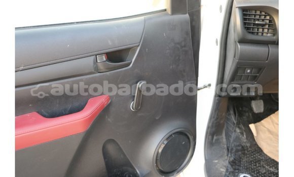 Buy Import Toyota Hilux White Car in Import - Dubai in Barbados Buy Import Toyota Hilux White Car in Import - Dubai in Barbados