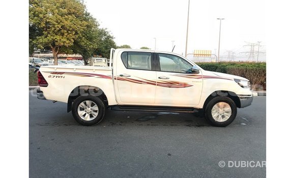 Buy Import Toyota Hilux White Car in Import - Dubai in Barbados Buy Import Toyota Hilux White Car in Import - Dubai in Barbados