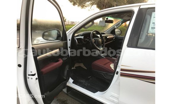 Buy Import Toyota Hilux White Car in Import - Dubai in Barbados Buy Import Toyota Hilux White Car in Import - Dubai in Barbados