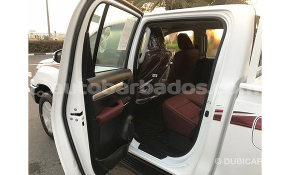 Buy Import Toyota Hilux White Car in Import - Dubai in Barbados Buy Import Toyota Hilux White Car in Import - Dubai in Barbados