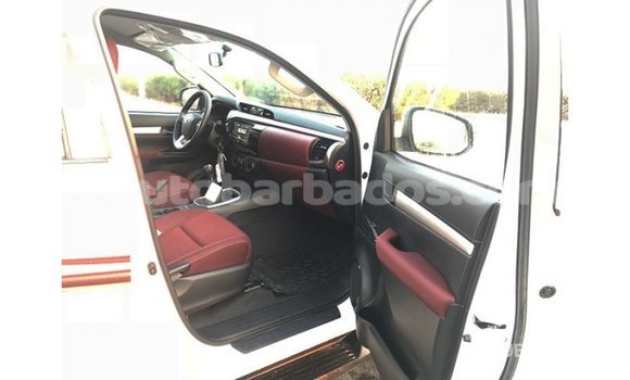 Buy Import Toyota Hilux White Car in Import - Dubai in Barbados Buy Import Toyota Hilux White Car in Import - Dubai in Barbados