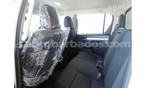 Buy Import Toyota Hilux White Car in Import - Dubai in Barbados Buy Import Toyota Hilux White Car in Import - Dubai in Barbados